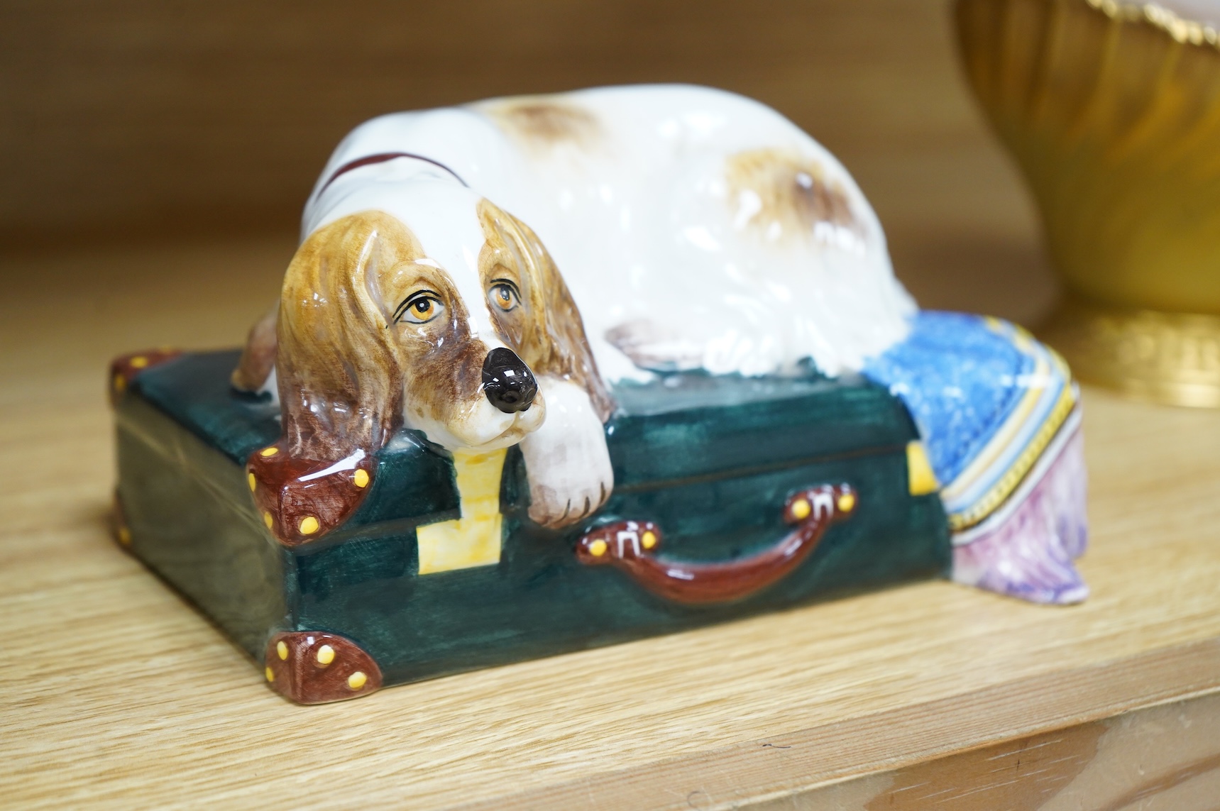 A Nove Italia ceramic sleeping dog, ‘exclusive for Tiffany & Co’ 19cm wide